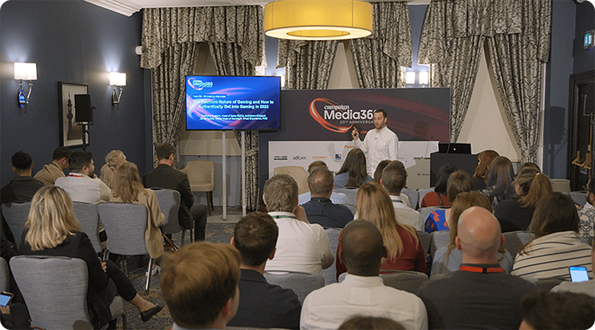 Anthony Lawson presents our latest research at Media360 in front of seated attendees.