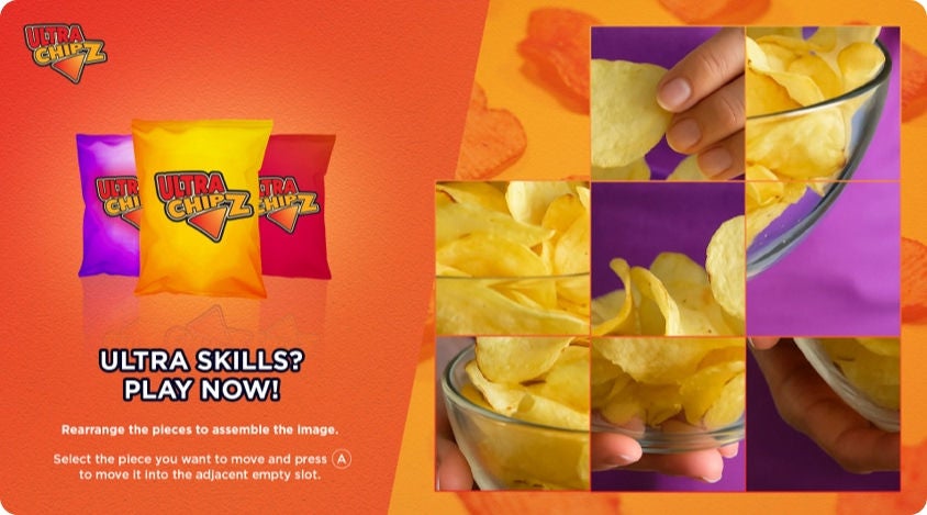 Orange-themed puzzle game graphic featuring three Ultra Chipz snack bags on the left—purple, yellow, and red—with the text “ULTRA SKILLS? PLAY NOW!” below. On the right, a sliding-tile puzzle shows a glass bowl filled with potato chips against a purple background, with several tiles rearranged and glowing edges.