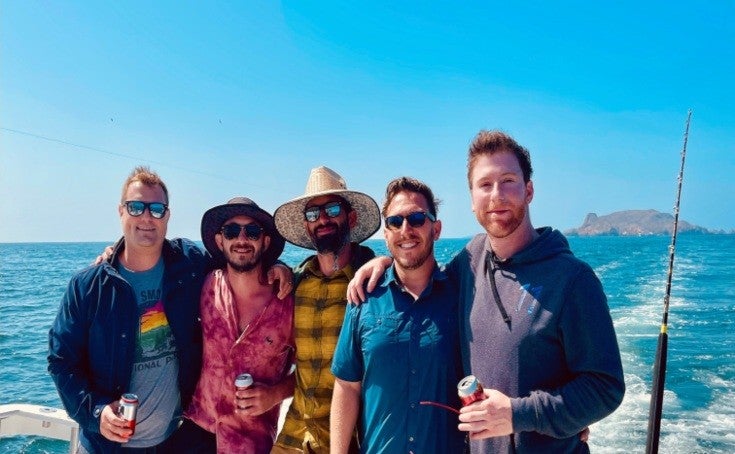 Author Francois Nikbakht II on a boat, deep-sea fishing in Ensenada, Mexico with friends.