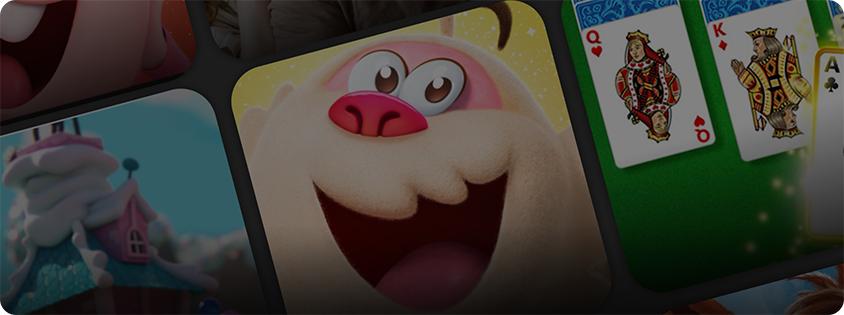 Cartoon-style game graphics with a smiling pink-nosed creature in the center, a snowy castle scene on the left, and playing cards on the right.